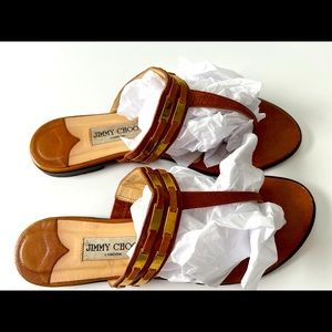 Jimmy Choo leather with Gold insert T-Strap sandals.